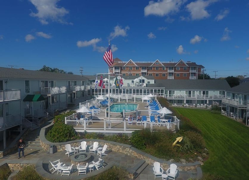Anchor In Distinctive Waterfront Lodging in Hyannis with outdoor pool and sundeck between motel buildings