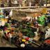 Boma Inn Nairobi in Nairobi interior with a colorful flower market display and shoppers