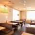 Hotel AZ Kumamoto Hokubu dining area in Kumamoto with booth seating and pendant lights