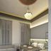 Agora Residence in Chios guest room with twin beds, chandelier, sofa and wood floor
