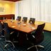 Fairfield Inn & Suites Parsippany meeting room with conference table and black chairs