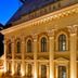 Millennium Court, Budapest - Marriott Executive Apartments facade with lit arched windows in Budapest