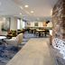 Fairfield Inn by Marriott Greensboro Airport lobby lounge in Greensboro with seating and dining tables