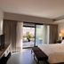 Libertad Hotel Buenos Aires guest room with king bed and balcony door in Buenos Aires