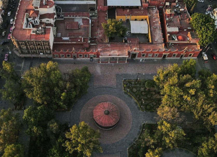 Meztli: Casa Boutique & Spa in Mexico City, aerial view of courtyard and historic red-roofed buildings