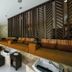 El Dorado Seaside Palms, All & More Inclusive - Adults Only lounge with orange seating and ocean-inspired decor