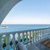Amara Dolce Vita Luxury in Tekirova balcony with sea view, white balustrade and lounge chairs