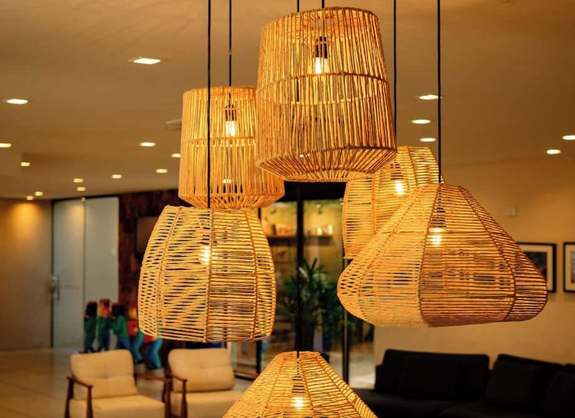 Imperial Palace Hotel in Juazeiro do Norte lobby with woven pendant lights over seating