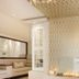 Banksia Boutique Hotel & Spa in Cape Town spa lounge with modern fireplace and patterned accent wall