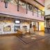 Stoney Creek Hotel Sioux City lobby with registration desk, seating area, and balcony railings in Sioux City.