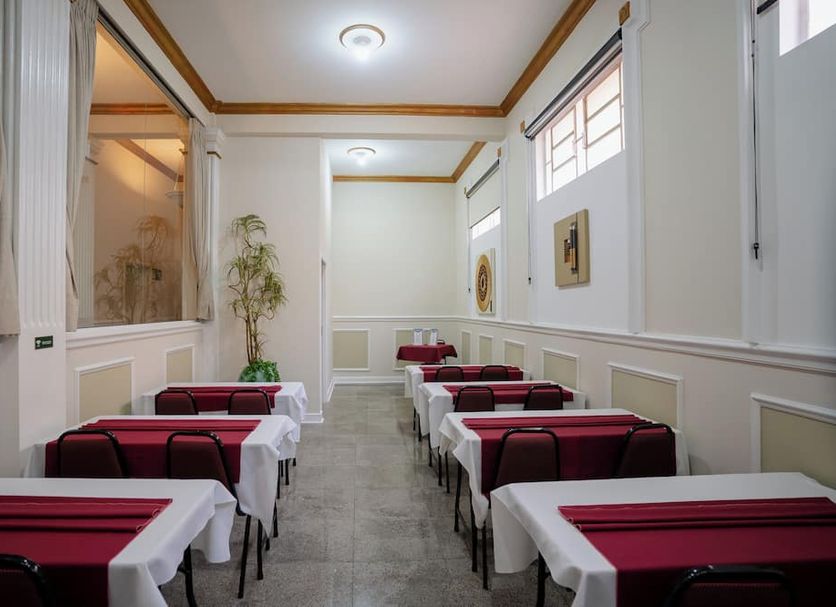 Hotel Minas Gerais in Poços de Caldas, dining room with rows of set tables and chairs