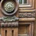 Le Petit Palais Buenos Aires carved wooden door with ornate decorative metal details