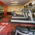 Courtyard by Marriott Kansas City East/Blue Springs fitness room with treadmills and dumbbells
