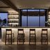 The Royal Senses Resort & Spa Crete, Curio Collection by Hilton bar with stools and sea view in Panormos
