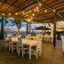 Legong Keraton Beach Hotel in North Kuta: open-air beachfront dining terrace with ocean view at dusk