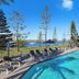 Silvershore Apartments on the Broadwater in Biggera Waters with lagoon pool, sun loungers and water views