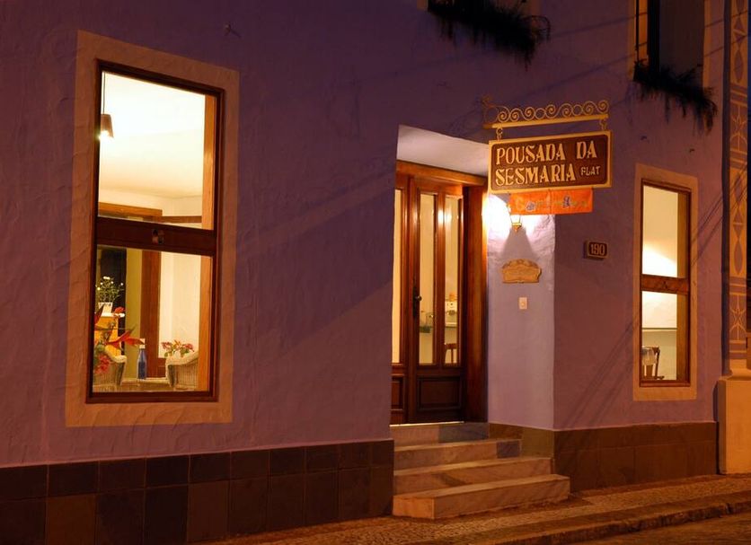 Pousada da Sesmaria in São Sebastião, nighttime exterior with lit entrance and windows