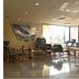 Hotel Shin-ei in Toyota lobby lounge with seating and large windows