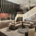 AC Hotels by Marriott Tallahassee Universities at the Capitol lobby with seating and grand staircase