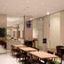 Dormy Inn Miyazaki Natural Hot Spring lobby dining area with tables and chairs in Miyazaki