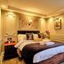 Muthu Ben Doran Hotel, Crianlarich: elegant guest room with a double bed, wall art, bedside lamps and window view