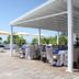 Mediterranea Hotel & Convention Center Salerno rooftop terrace with sea view, tables and umbrellas