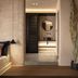 Emery Hotel in Naxos room with wood bench, mirror vanity, and decorative palm leaves