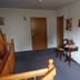 Erbgericht Gaststätte & Pension in Brand-Erbisdorf hallway with wood doors, chairs and small table