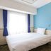 Toyoko Inn Tokyo Nihombashi Hamacho Meijiza Mae guest room with single bed and bright window in Tokyo