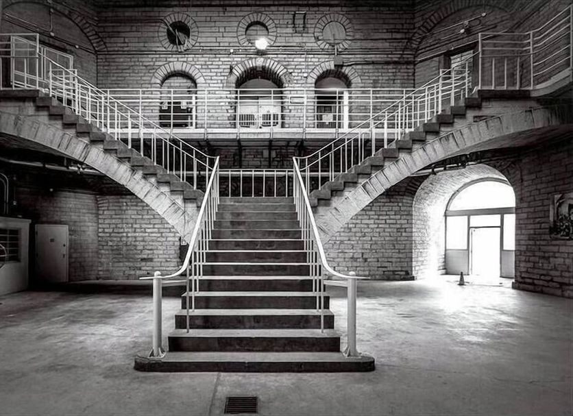 Donald Gordon Hotel and Conference Centre in Kingston: grand central staircase in historic brick atrium