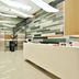 60 West Hotel Hong Kong reception desk and elevator lobby with modern geometric wall panels