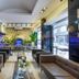 Marlight Boutique Hotel Izmir lobby lounge with seating, bar, and greenery wall