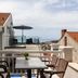 Guest House Kono, Dubrovnik terrace with table, chairs and sea view