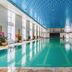 Liuhu Hotel (Hot Spring Garden Hotel) indoor swimming pool in Dezhou with blue patterned ceiling