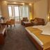 Flair Hotel zum Schiff Meersburg room with double bed, seating area and balcony doors