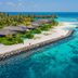 Kagi Maldives Resort & Spa in Kagi, with overwater villas along a turquoise beach and lagoon