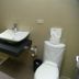 Big Hotel Suites Mandaue City bathroom with vessel sink, toilet, and walk-in shower