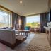 Hakodate-Onuma Prince Hotel in Nanae lounge with large windows and forest view