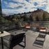 Sky Hotel Apartments Stockholm rooftop terrace with seating and city views in Stockholm