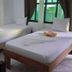 Cabinas Tortuguero Natural in Tortuguero: simple guest room with three single beds and window view