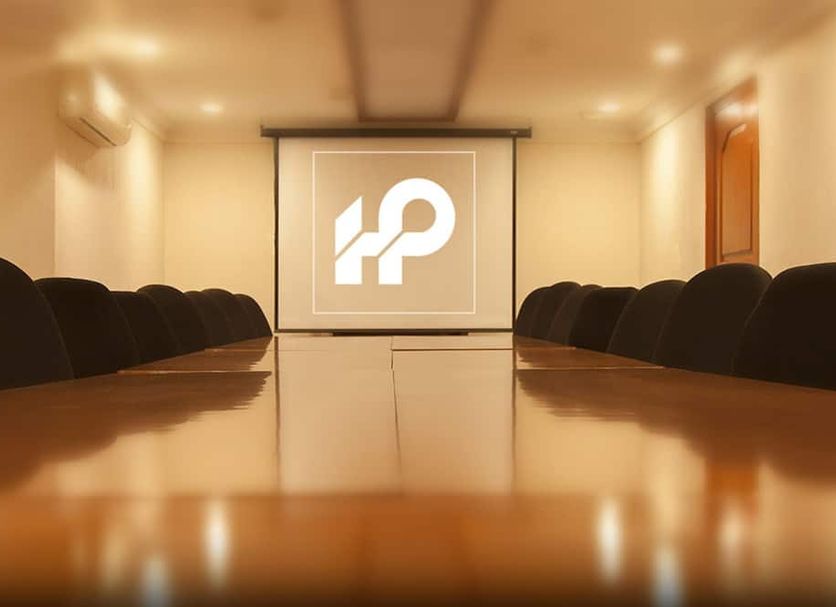 Hotel Polanco meeting room in Mexico City with long conference table and projector screen