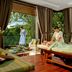 Spa treatment room at Gaya Island Resort, Kota Kinabalu with massage beds and garden views