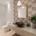 Sabai Mansion Pool & Spa in Krabi bathroom with walk-in shower, toilet, vessel sink and patterned tile walls