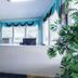 Home Suites Hill Country in San Antonio lobby reception desk with large windows and blue window valances