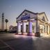 Baymont by Wyndham Port Arthur/Groves Area in Port Arthur, exterior entrance at dusk