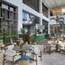 Open-air lobby lounge at JW Marriott Gold Coast Resort & Spa in Surfers Paradise with seating and palms