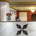 Hotel Ik London Residency Hyderabad reception desk with chandelier and marble counter