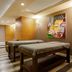 Wyndham Garden Lara Antalya spa treatment room with two massage tables and colorful wall art