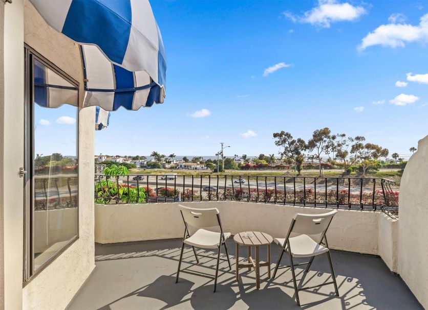 Travelodge by Wyndham San Clemente Beach balcony with chairs and ocean view in San Clemente