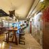 Military 75 Hotel in Taichung City lobby with bar, high tables, stools and mosaic wall